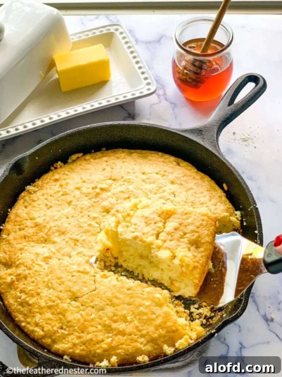 Bisquick Cornbread No Cornmeal Needed 7 A golden-brown slice of Bisquick cornbread without cornmeal, moist and tender.