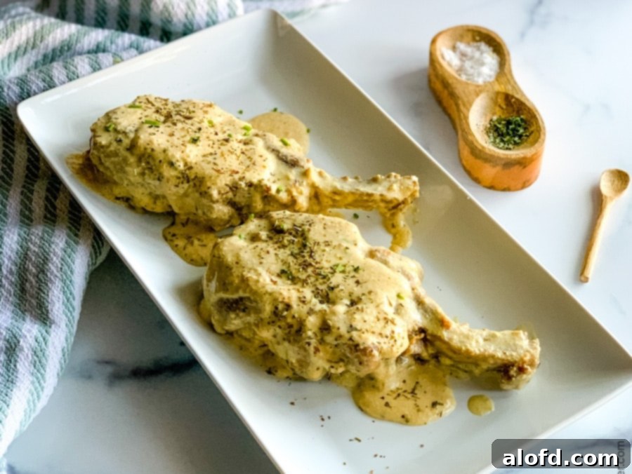 Velvet Cream Pork Chops 6 platter of bone-in pork chops ready to serve.