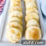 A plate of frosted crème brûlée cookies, perfectly lined up.