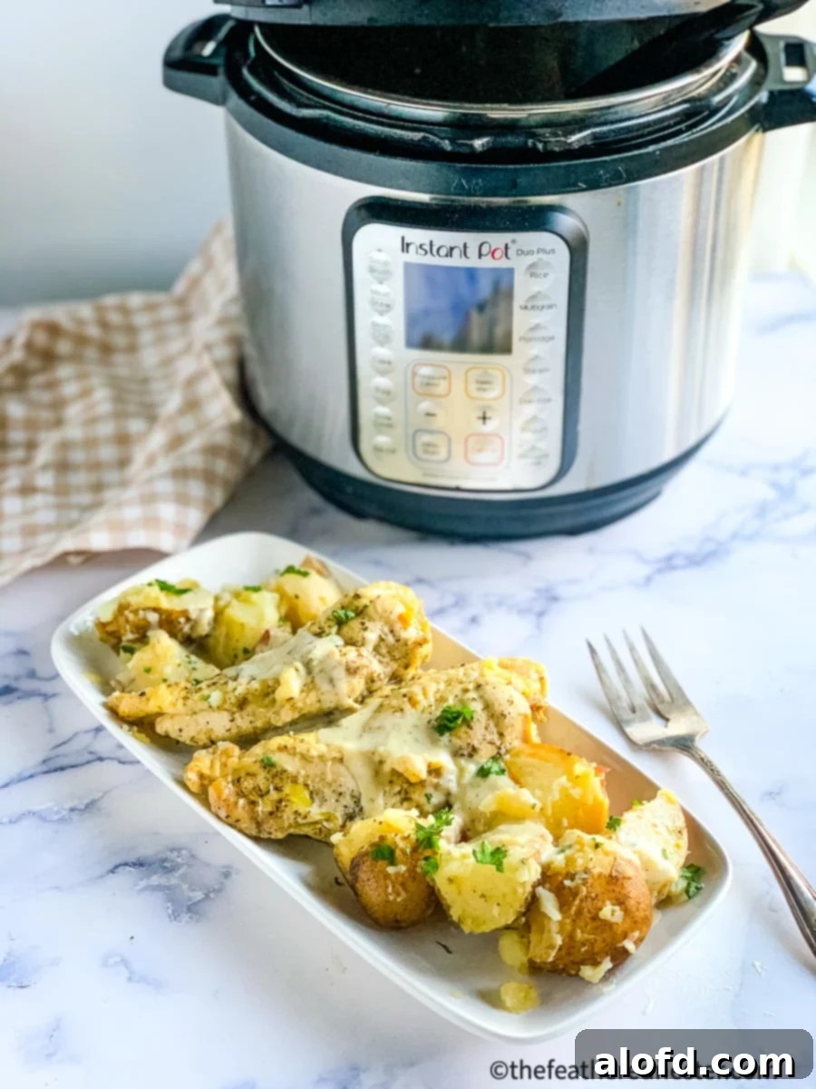 Creamy Instant Pot Ranch Chicken 2 Photo of instant pot creamy ranch chicken and potatoes with cream cheese. A delicious, family-friendly dinner.