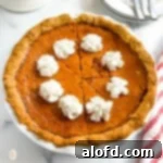 Whole carrot pie in a pie plate.