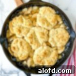 A freshly baked Bisquick Apple Cobbler, golden brown and bubbling.