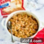 A delicious apple fritter breakfast bake, golden brown and glistening with glaze.