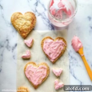 Cupid's Confections 11 valentines pop tarts on top of a parchment paper.