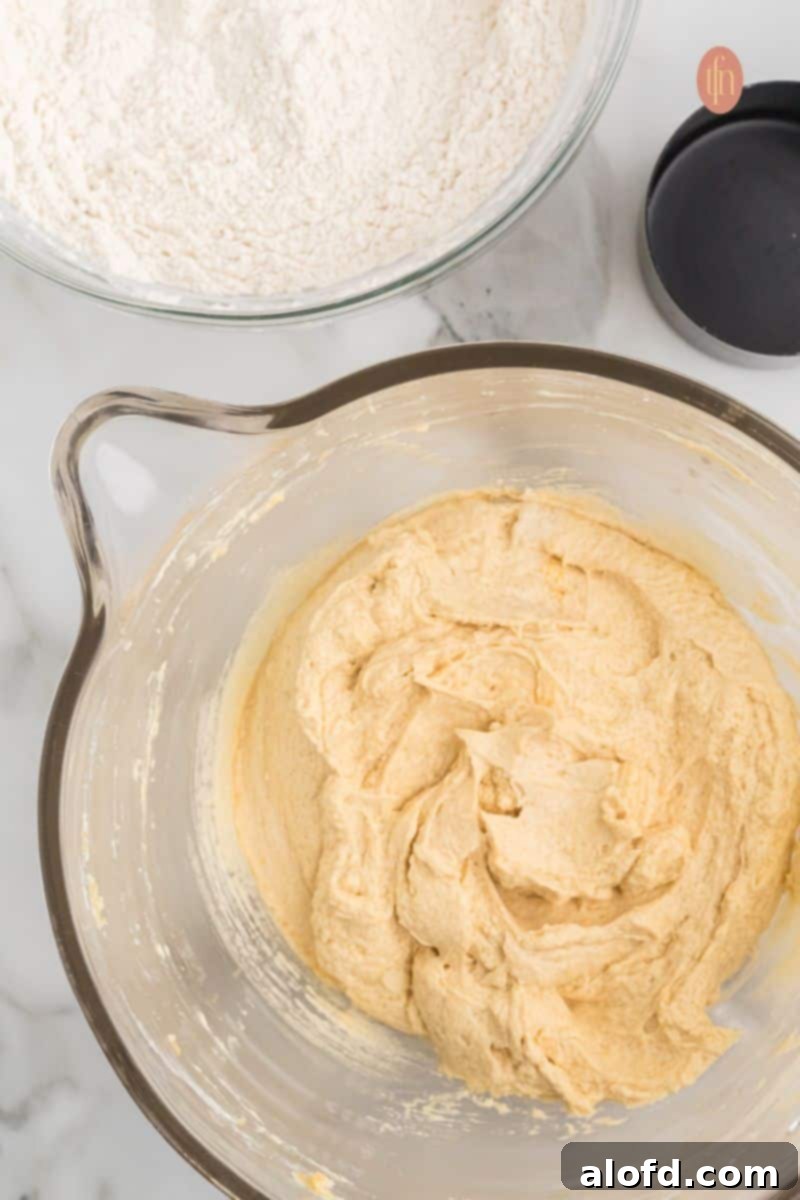 A bowl of batter and flour.
