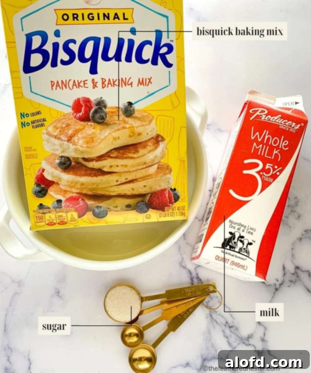 Labeled ingredients for cherry cobbler, including cans of cherry pie filling, a bag of Bisquick mix, a jug of milk, sugar, and a stick of butter.