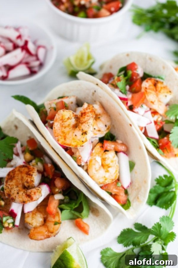 Delicious one-pan Shrimp Tacos served with fresh pico de gallo.