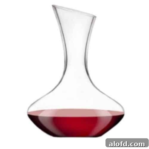 A beautifully crafted Godinger Wine Decanter Carafe, featuring a hand-blown design ideal for aerating wine and enhancing its flavors, a sophisticated gift for any wine lover or entertainer.