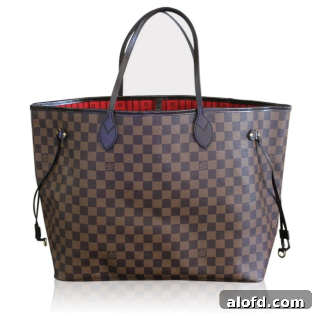 My Unfiltered Review of the Louis Vuitton Neverfull 3 A stylish Louis Vuitton Neverfull GM tote in classic Damier Ebene canvas, perfect for daily use or travel.