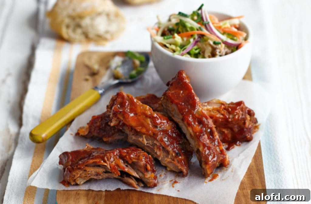 The Feathered Nester's Food Quest 8 Slow cooker teriyaki ribs beautifully arranged on a platter, showcasing their sticky, glazed finish and tender appearance from the meal challenge.