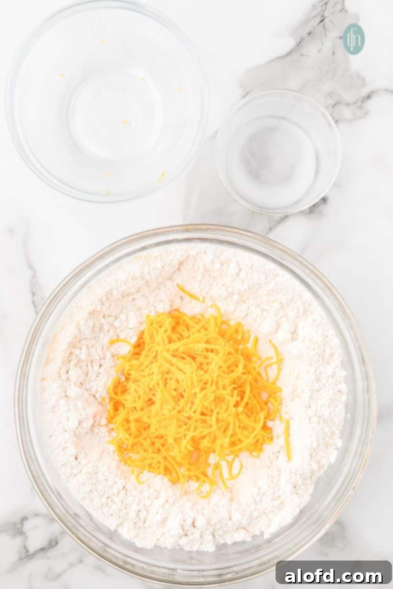 Bisquick Garlic Cheddar Biscuits 10 A mixing bowl showing the dough coming together, sticky and lumpy.