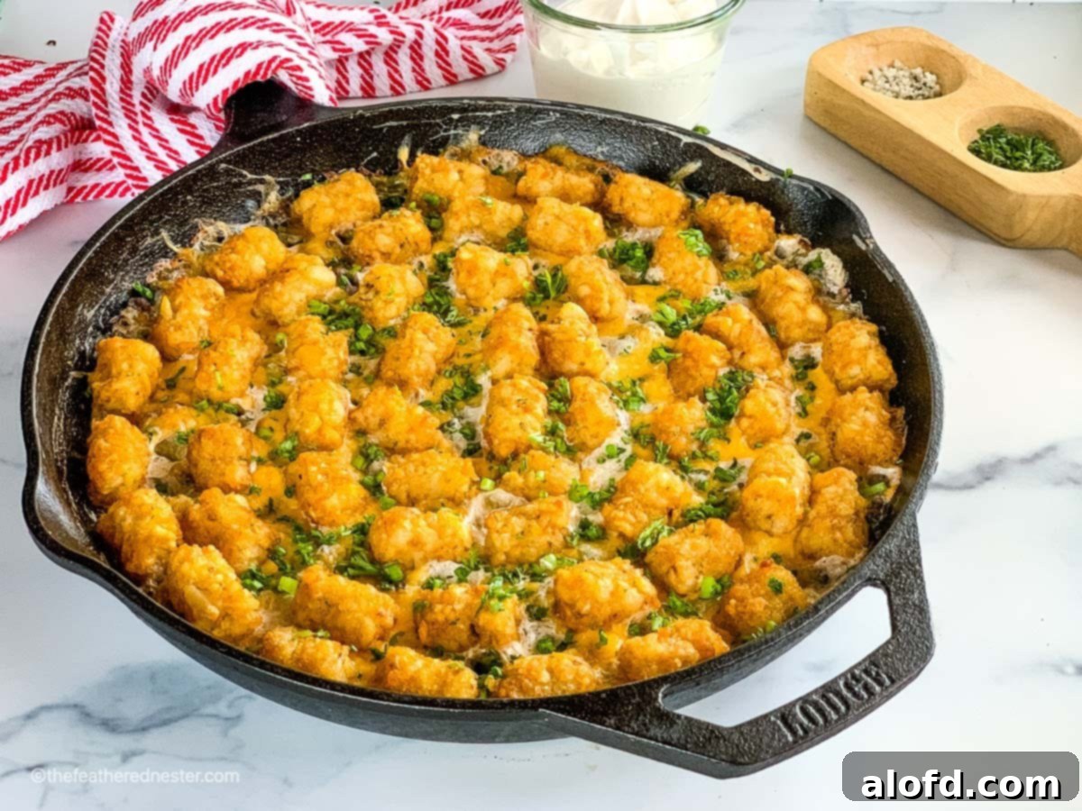 Crispy Tater Tot Green Bean Bake 8 Hamburger hotdish of green bean casserole with tater tots.