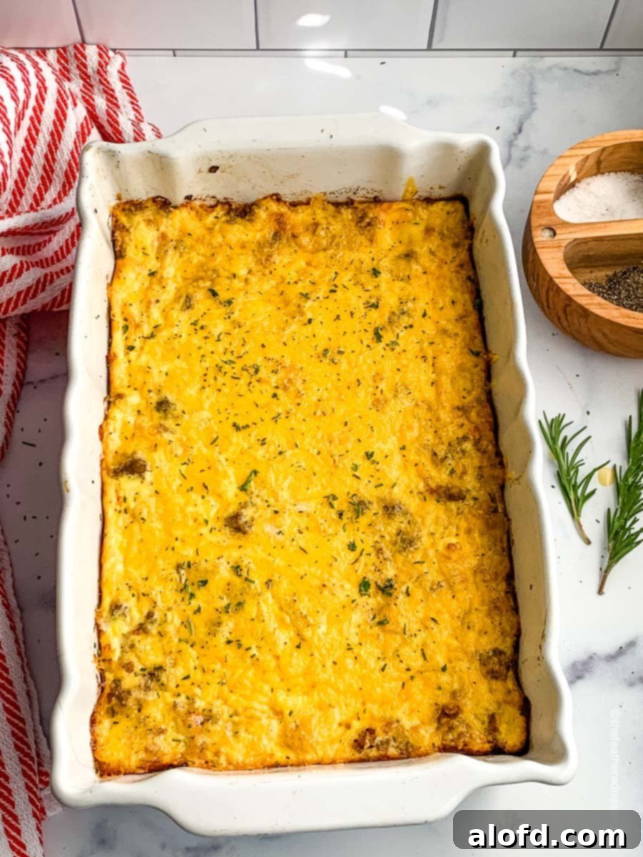 Ultimate Hash Brown Breakfast Bake 10 A freshly baked, bubbly hash brown breakfast casserole, golden brown and ready to be served from the casserole dish.