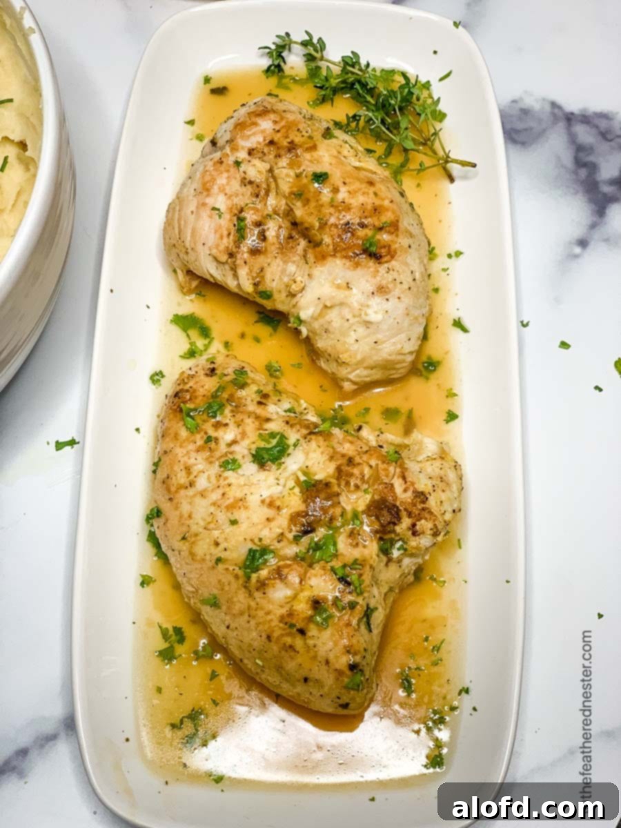 Juicy Instant Pot Turkey Tenderloin 7 A festive platter showcasing sliced turkey tenderloin, generously covered in homemade gravy, ready for a delicious meal.