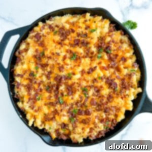 Skillet of smoked mac and cheese with bacon.