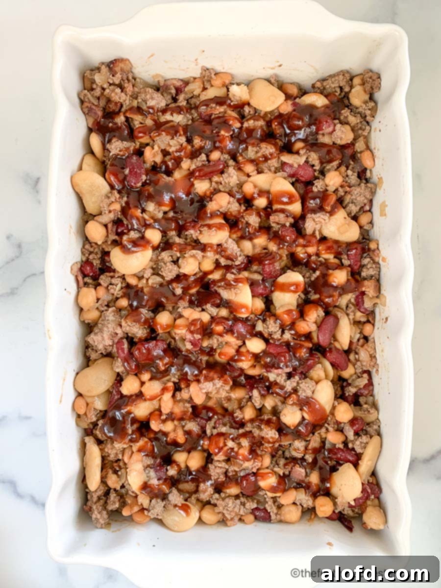 Vibrant Bean Medley Bake 6 a casserole of mixed beans ground beef and bacon.