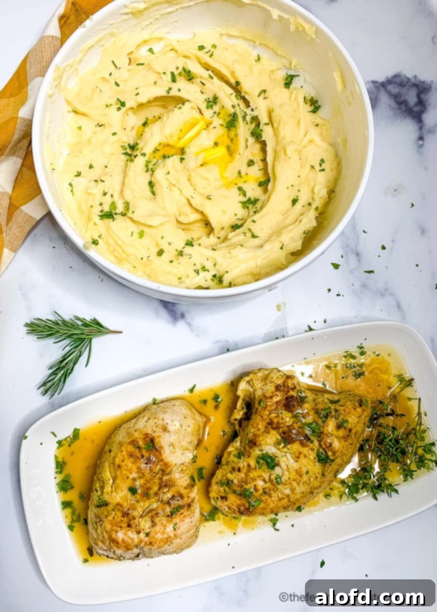 Creamy Instant Pot Garlic Mash 8 Instant Pot garlic mashed potatoes served alongside perfectly cooked turkey tenderloins, garnished with herbs.