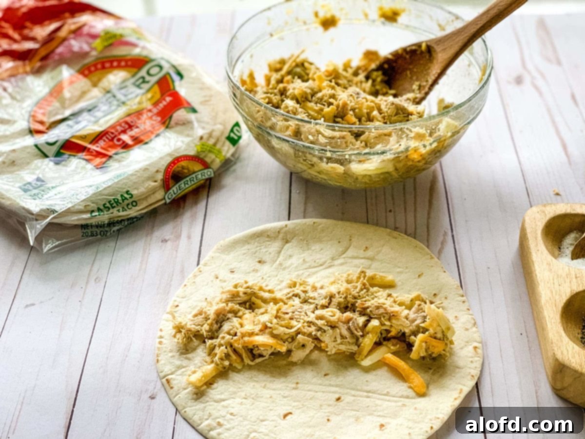 Luscious Sour Cream Chicken Enchiladas 8 creamy chicken enchiladas preparation.