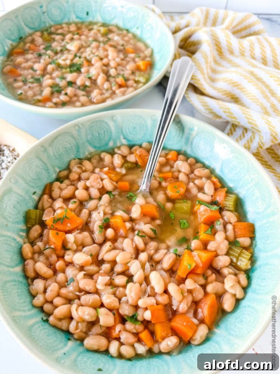 Two green bowls of no soak instant pot bean soup.