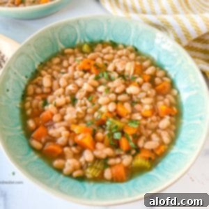 a green bowl of navy beans instant pot.