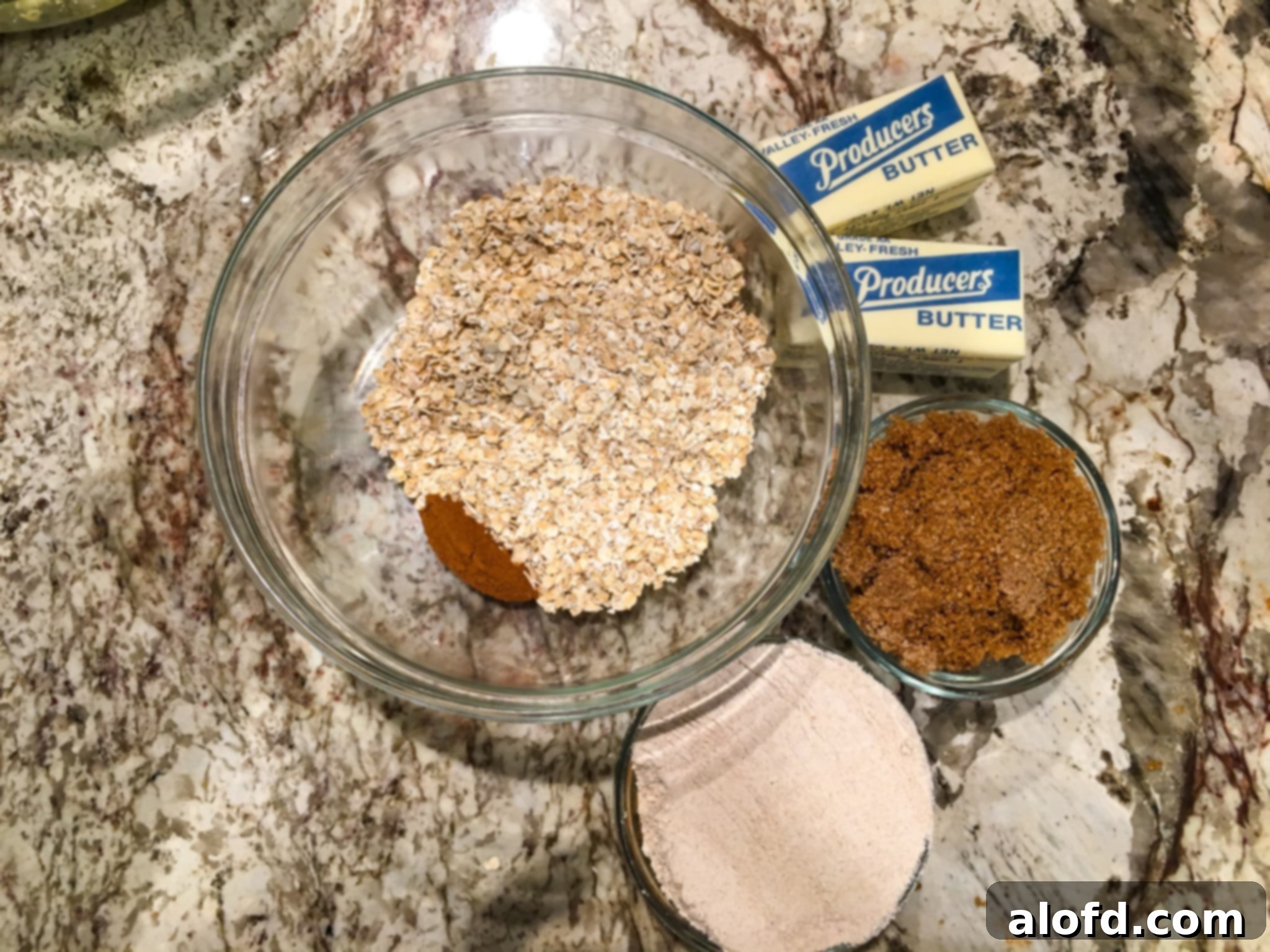 Various types of sugar including turbinado, coconut sugar, and raw granulated cane sugar, illustrating options for the apple crisp filling.
