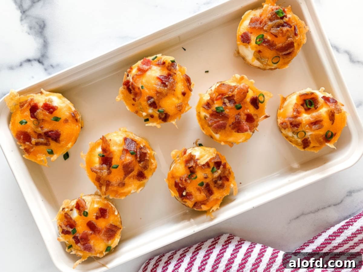 Crispy Hash Brown Egg Cups 14 White serving tray with birds nest eggs.