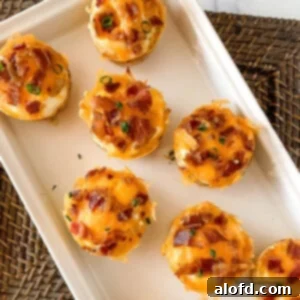Crispy Hash Brown Egg Cups 15 square photo of a white tray with hash brown breakfast cups.