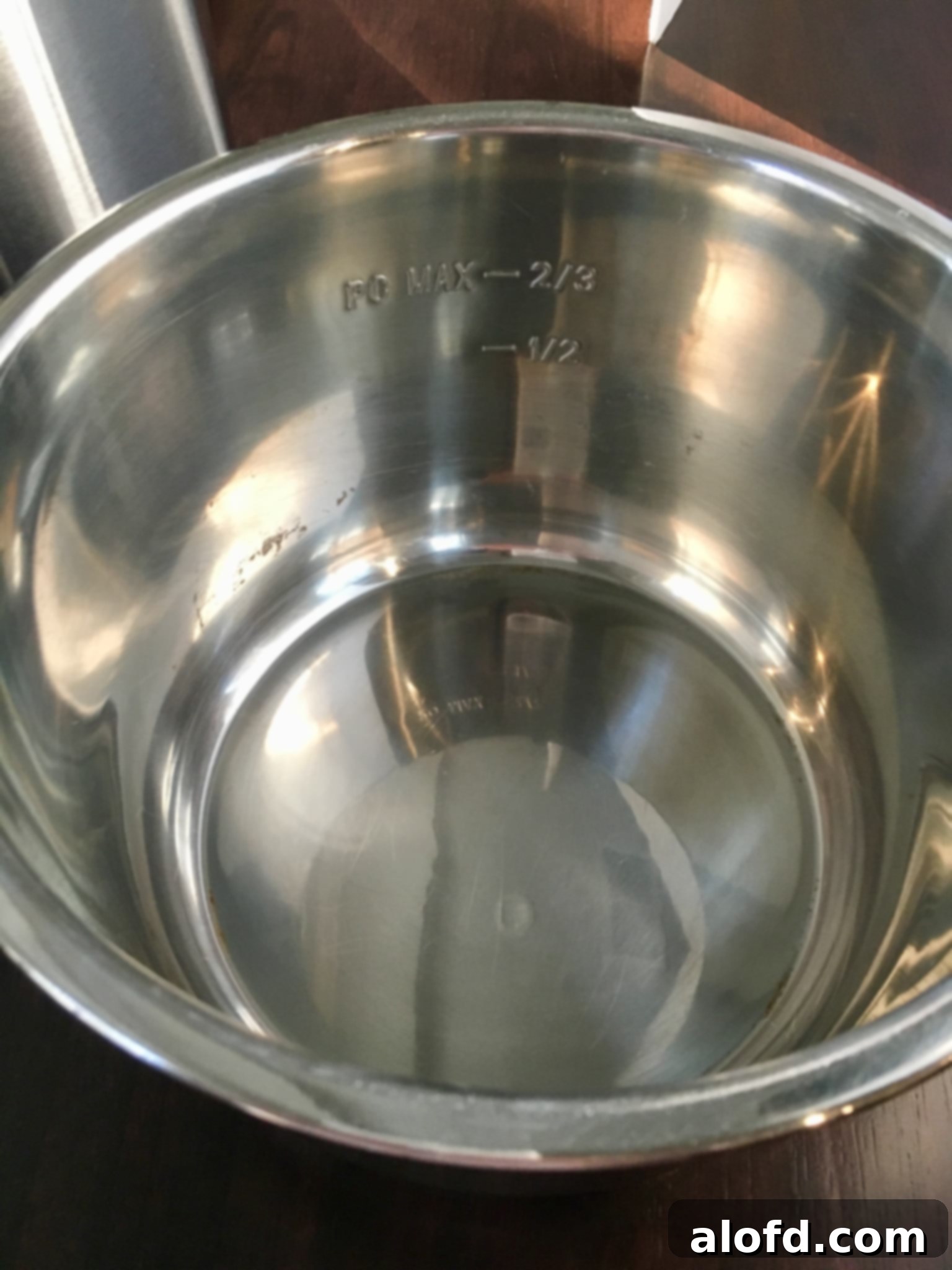 Maximize Your Instant Pot 3 Close-up of the shining stainless steel inner pot of an Instant Pot.