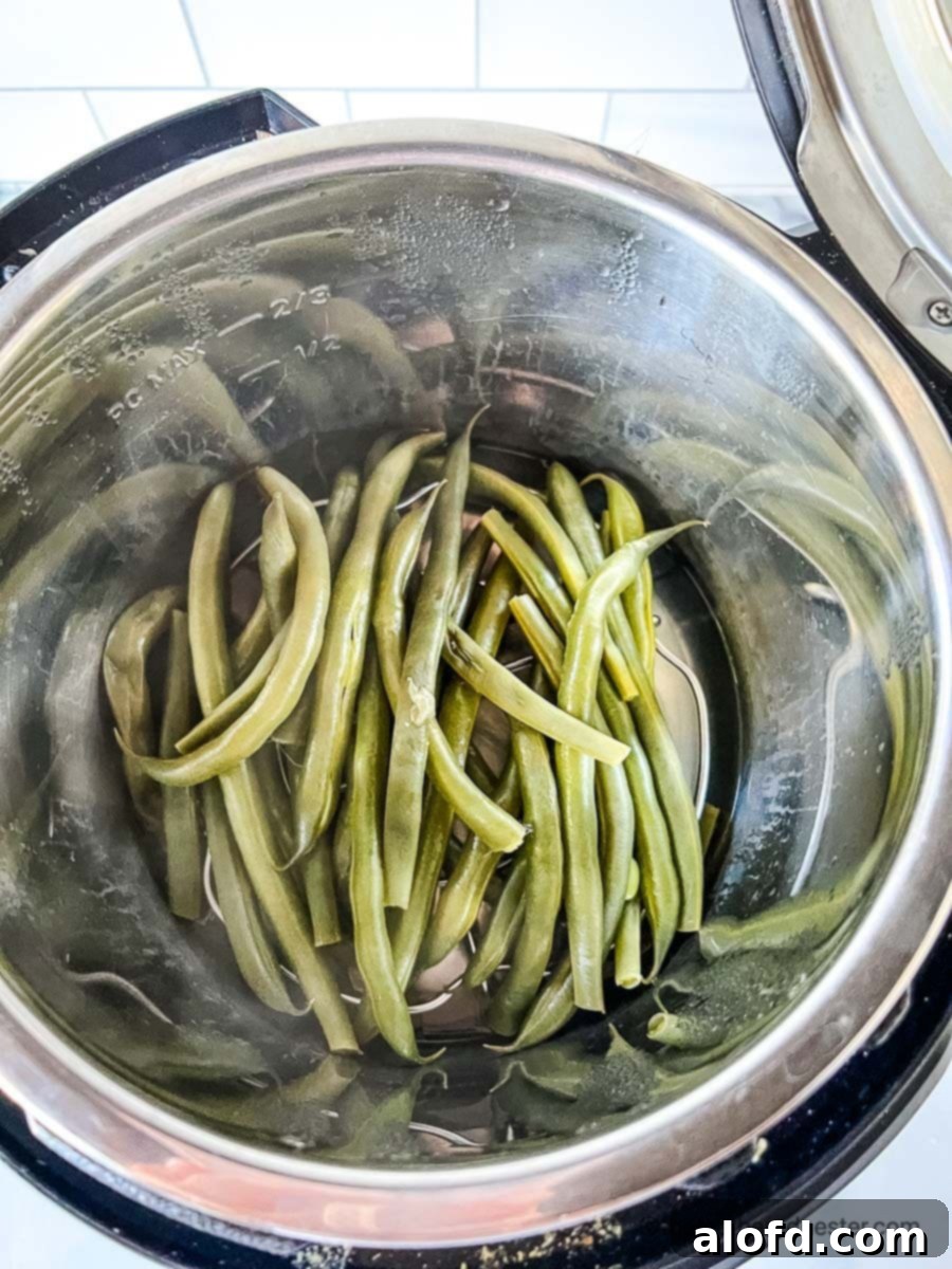 Quick and Tender Instant Pot Green Beans 7 Cooked green beans in an instant pot.