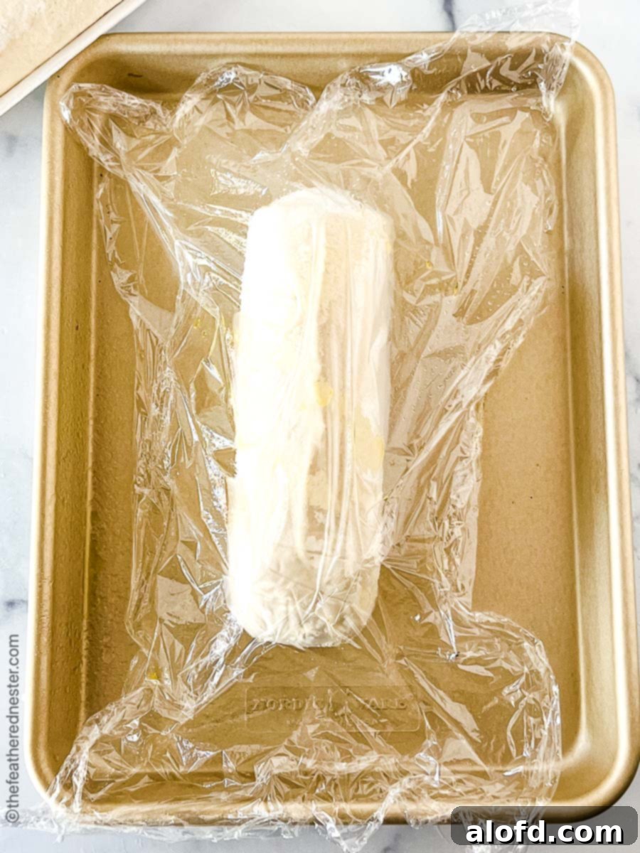 Flame-Kissed Pizza 6 A thawed loaf of Ready-Dough, showcasing its readiness for shaping into a pizza crust.