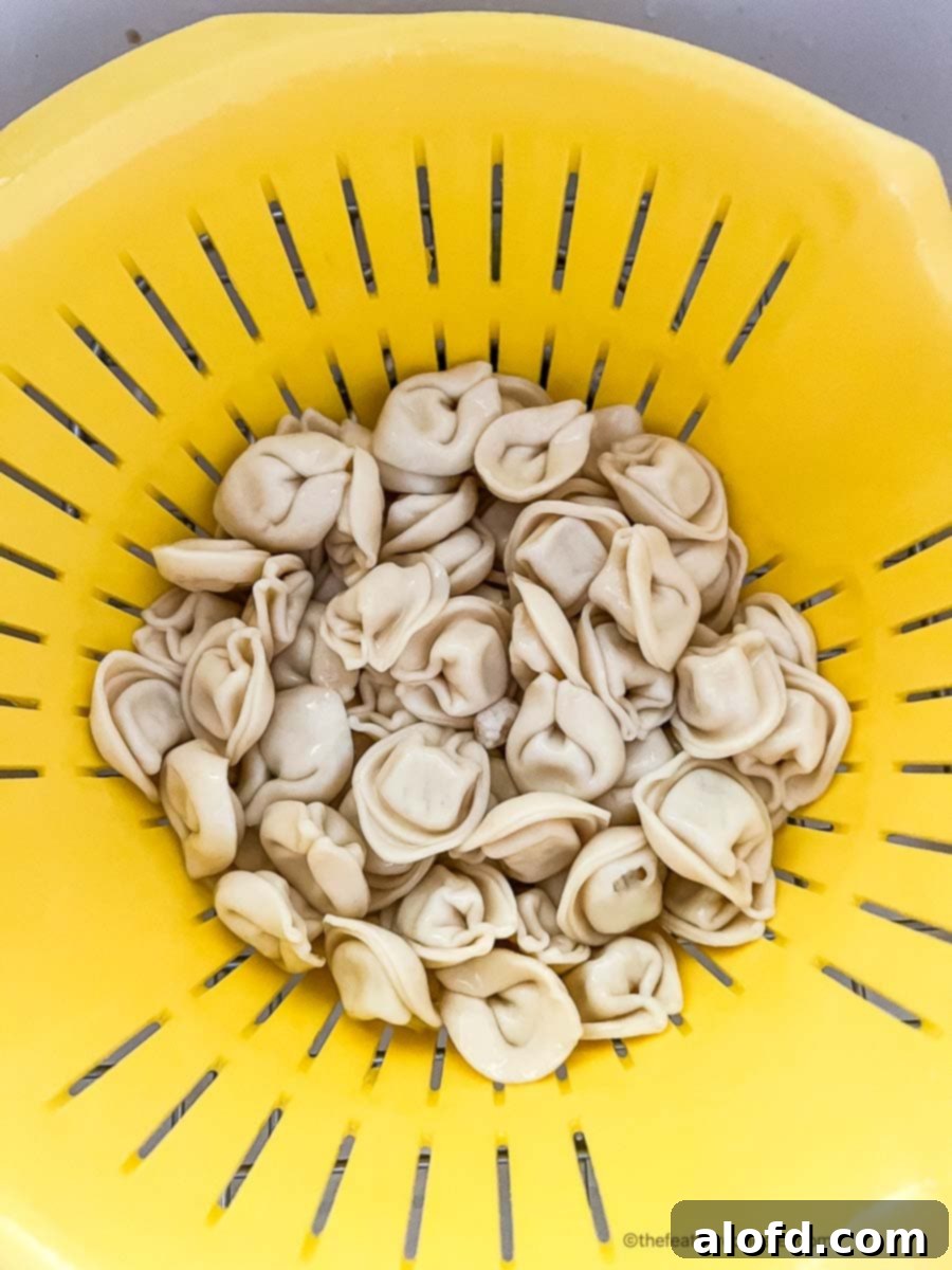 Caprese Tortellini Poppers 7 Cooked cheese tortellini drained in a colander
