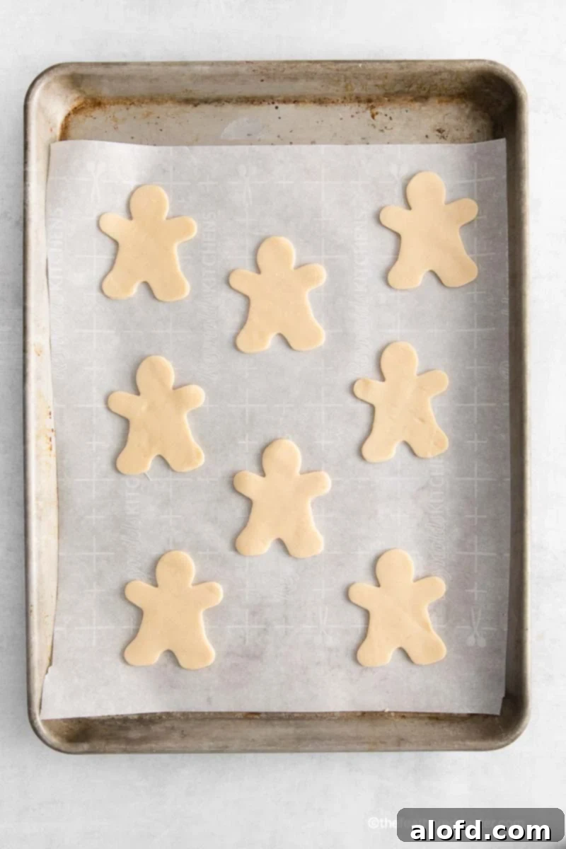 halloween hand pie pastry ready to fill on a parchment lined baking sheet