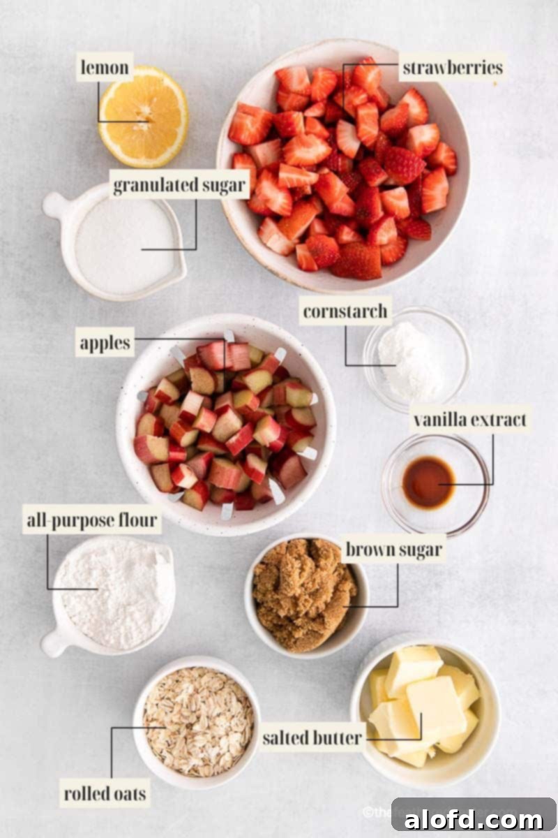 Labeled ingredient image for apple strawberry crisp recipe, showing fresh fruit, sugar, flour, and oats.