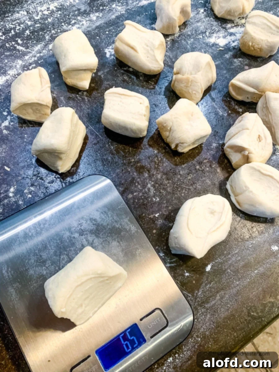 Rustic Sourdough Buns 8 Cutting the dough into 16 equal pieces.