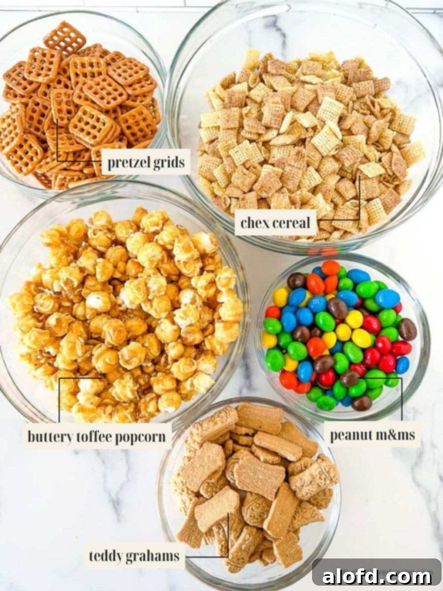 Irresistible M&M Chex Party Snack 4 Labeled ingredient image showcasing all components for the Chex Party Mix Recipe with M&Ms.