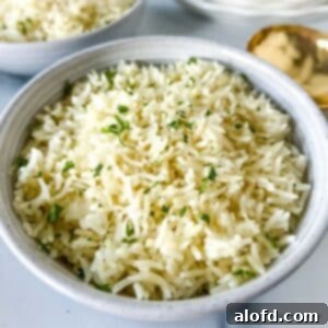 Perfect Instant Pot Basmati Rice 12 A white bowl of Instant Pot Rice ready to serve.
