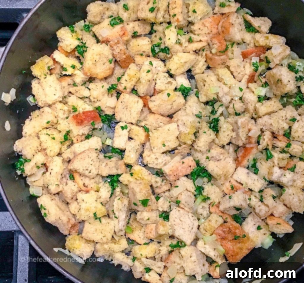 Our Top 5 Thanksgiving Dinner Recipes 7 A delicious homemade sourdough stuffing, golden brown and baked to perfection, ready for a Thanksgiving dinner.