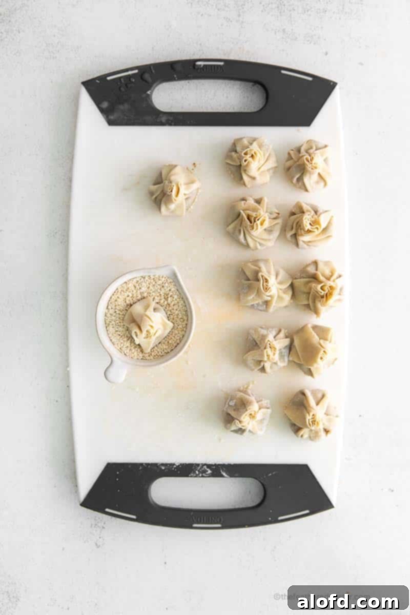 Umami Mushroom Pockets 10 A collection of freshly prepared mushroom vegetarian dumplings, neatly arranged on a chopping board, eagerly awaiting their final cooking stage.