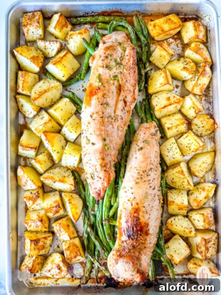 Effortless Sheet Pan Pork Tenderloin 7 Sheet pan pork tenderloin with roasted potatoes and green beans.