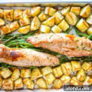 Effortless Sheet Pan Pork Tenderloin 10 Roasted green beans, pork and potatoes on sheet pan.