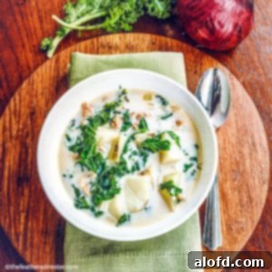 Rustic Tuscan Sausage and Kale Soup 7 An image of Zuppa Toscana in a rustic bowl, ready to be served.