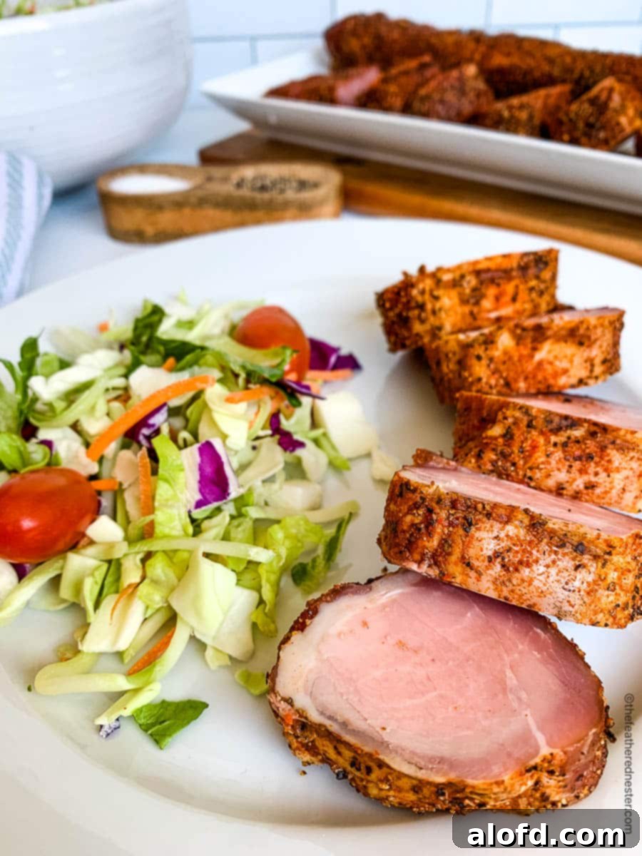 Dozens of Delightful Family Meals Under Ten Bucks 7 Smoking pork tenderloin slices.