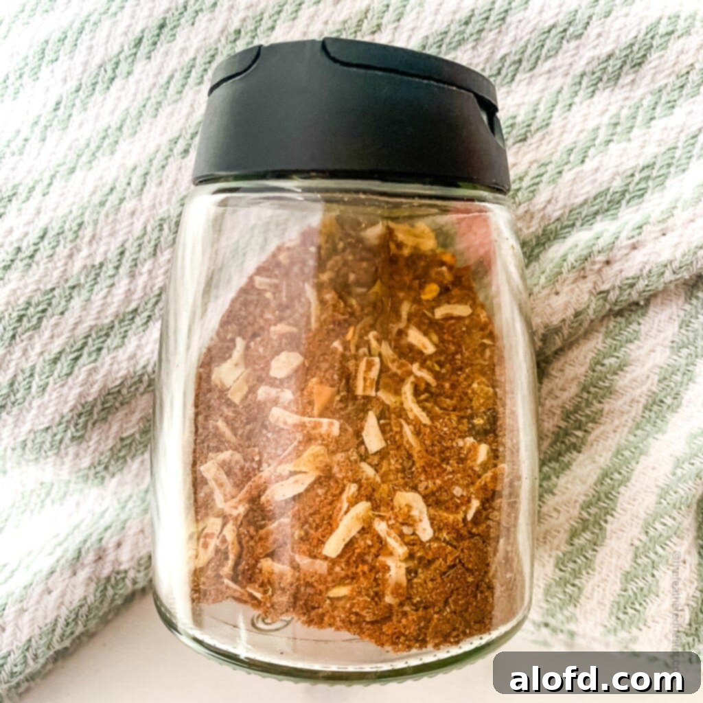 Ultimate Chicken Taco Mix 3 Chicken taco spice mix inside a spice container.