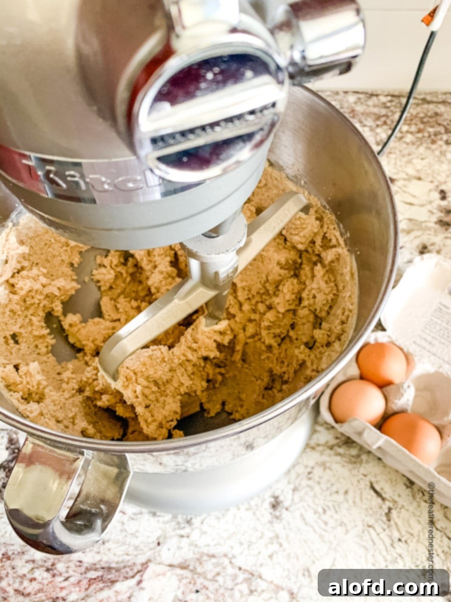 Festive M and M Christmas Cookies 5 A mixer of cookie dough.