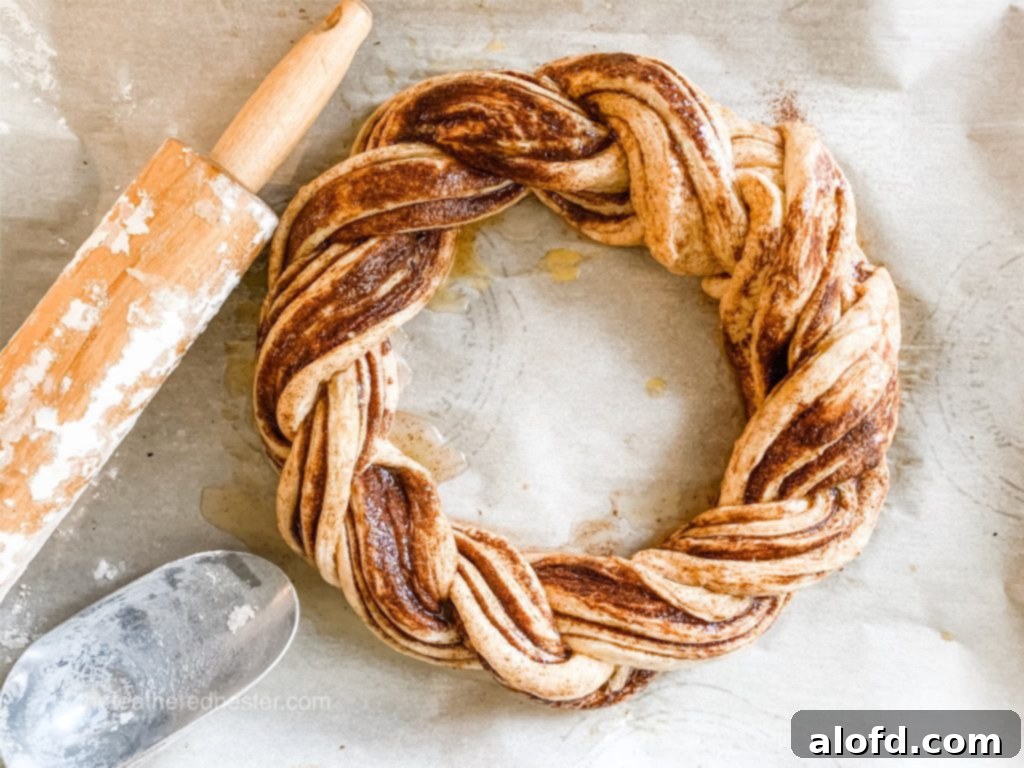 Close-up of the pumpkin spice bread twist dough, showing the rolled layers before cutting and twisting.