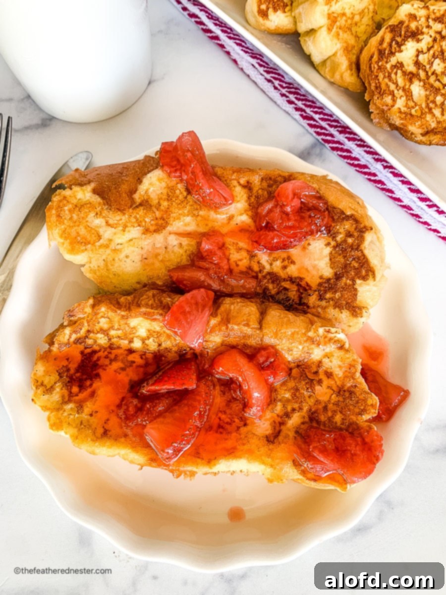 Luscious Strawberry French Toast 5 Plated Valentine's Day breakfast with strawberry French toast, fresh berries, and a rose.