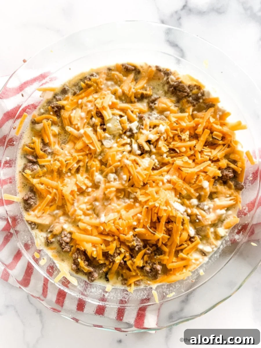 Hearty Bisquick Cheeseburger Bake 8 Bisquick cheeseburger pie, unbaked, ready for the oven.