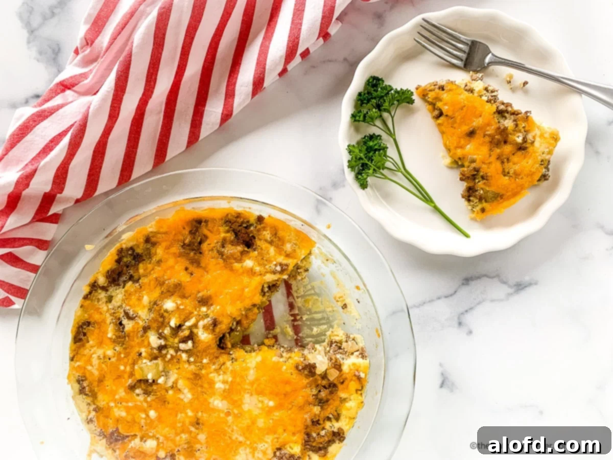 Hearty Bisquick Cheeseburger Bake 9 Bisquick cheeseburger pie in a round baking dish next to a plated serving.