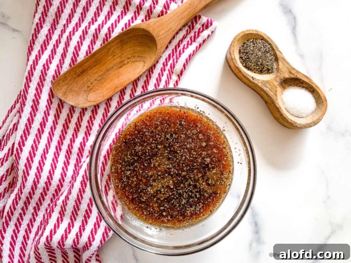 Marinade for pork in a glass bowl, ready for meat.