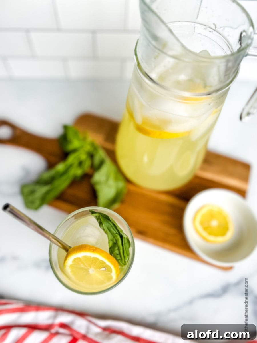 Overhead: looking down into a glass filled with citrus drink